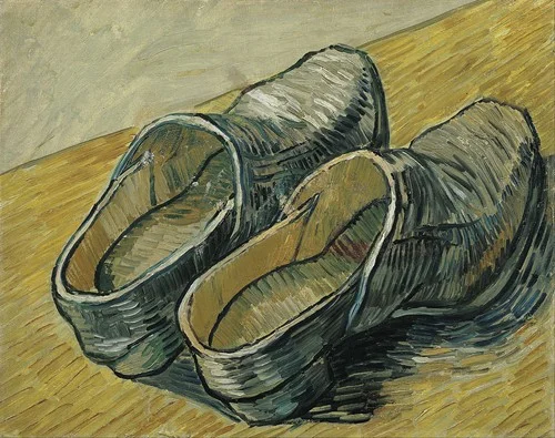 A pair of leather clogs (1888)